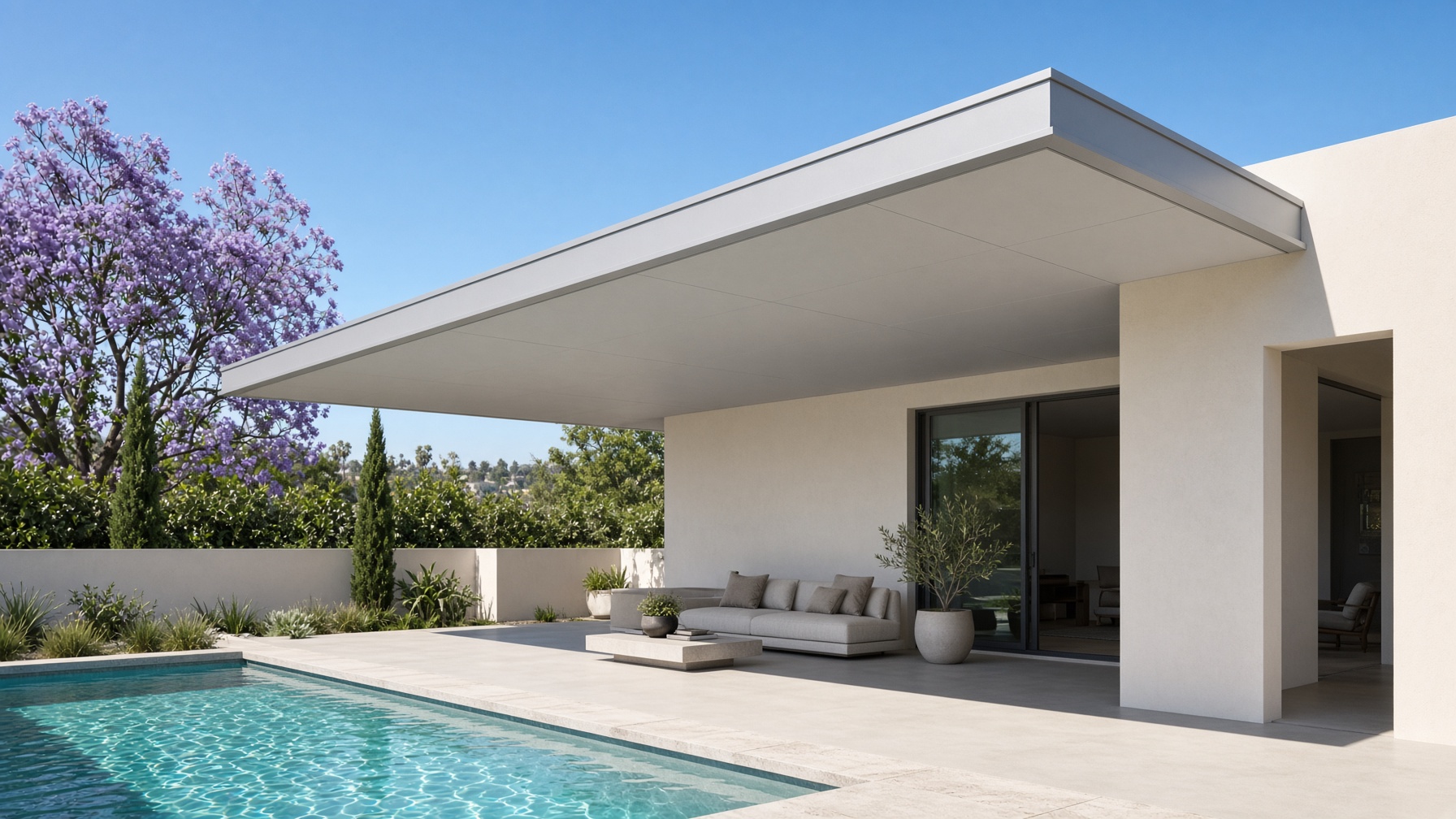 A cantilevered patio roof over a pool terrace with no front posts